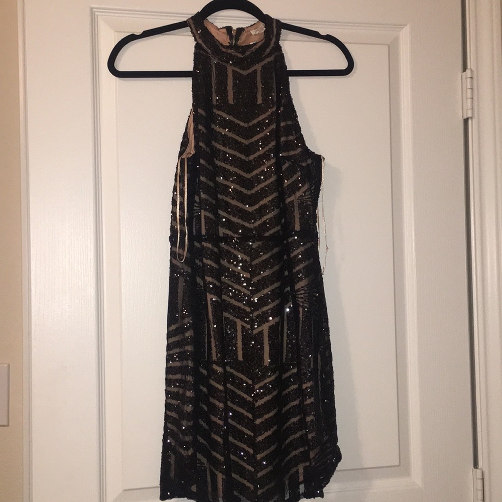 Nude and black sequin dress
